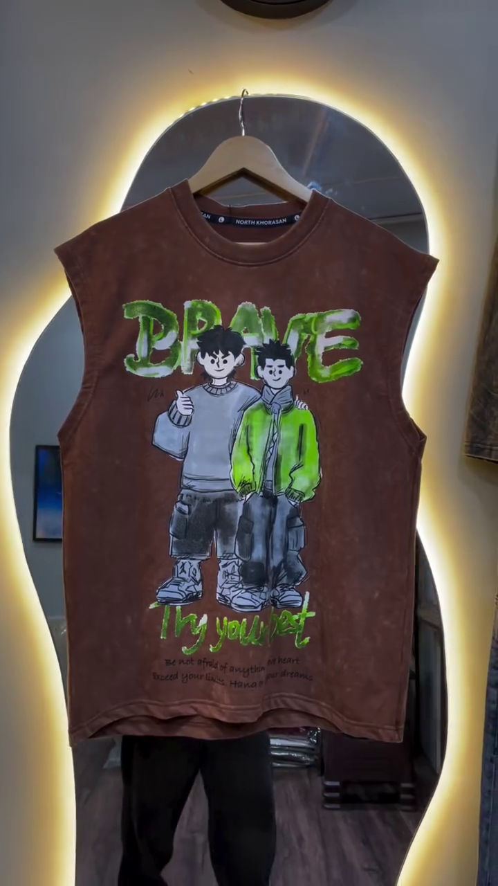 Edgy Streetwear Vibes: Graphic Sleeveless Tee with Bold Artistic Expression