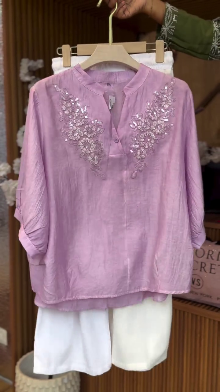 Soft Elegance: Pastel Embroidered Top with Relaxed White Trousers