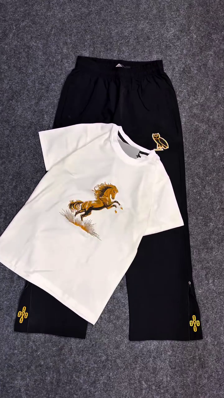 Casual Statement: Graphic Tee & Track Pants with Bold Detailing