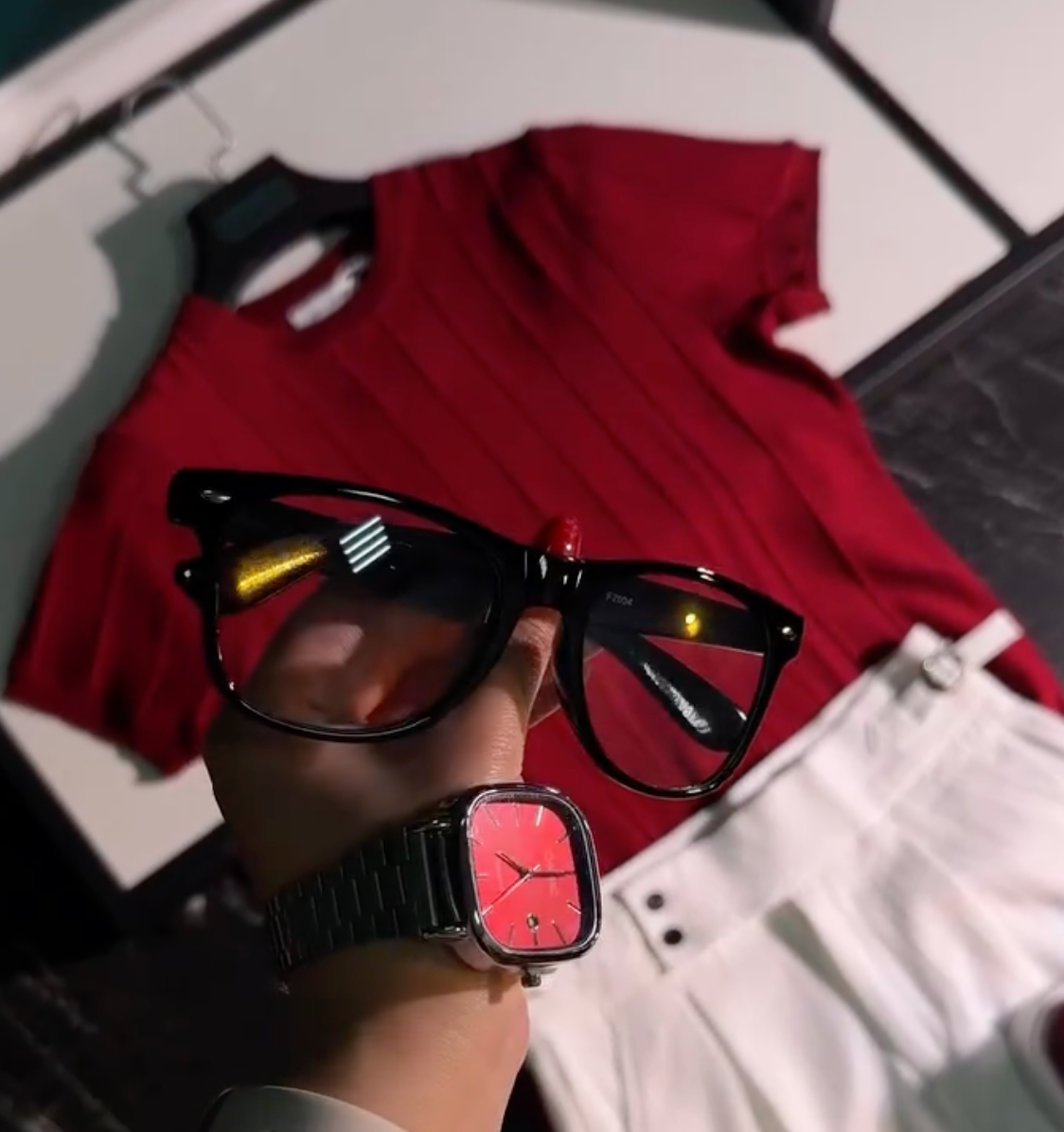 Bold Casual Streetwear Look with a Rich Red Polo T-Shirt, White Denim, Statement Sunglasses and Modern Watch