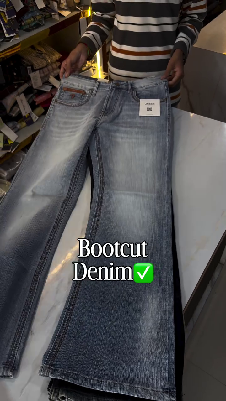 Stylish  Bootcut Denim Jeans for Men with Classic Five-Pocket Design and a Modern Slim-to-Flared Fit