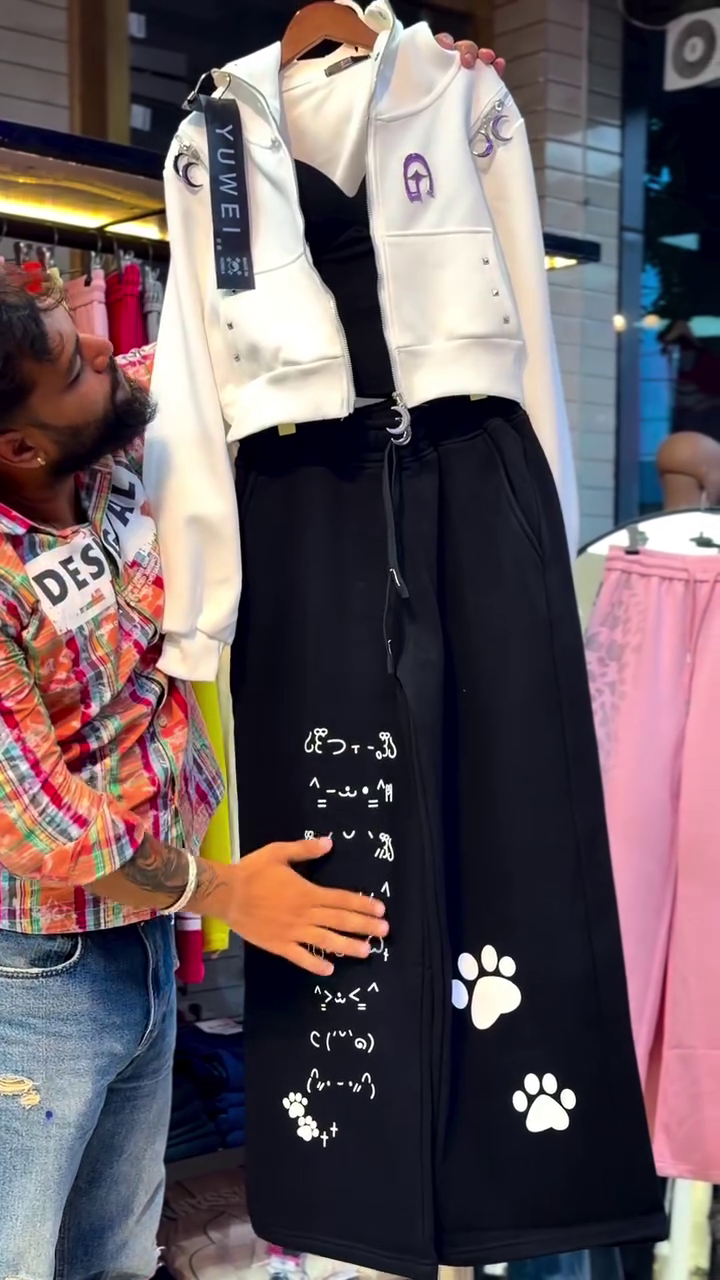 Trendy White Cropped Jacket with Black Wide-Leg Paw Print Pants Co-Ord Set