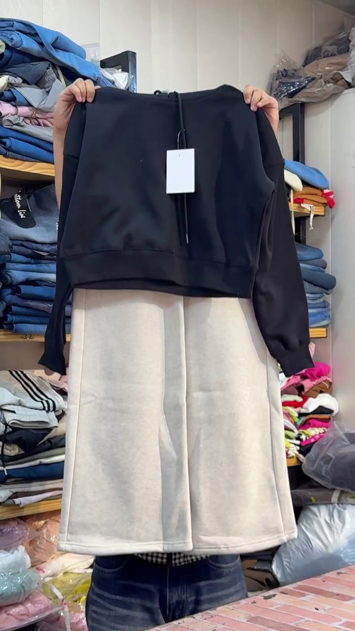 Trendy Black Cropped Top with Relaxed Cream Wide-Leg Pants – Stylish & Modern Casual Outfit