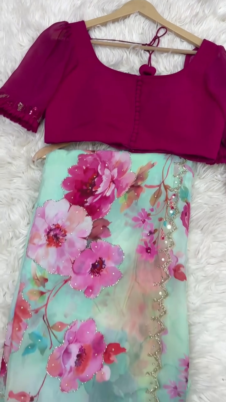 Elegant Mint Green Floral Saree with Golden Embellishments and a Stylish Magenta Blouse