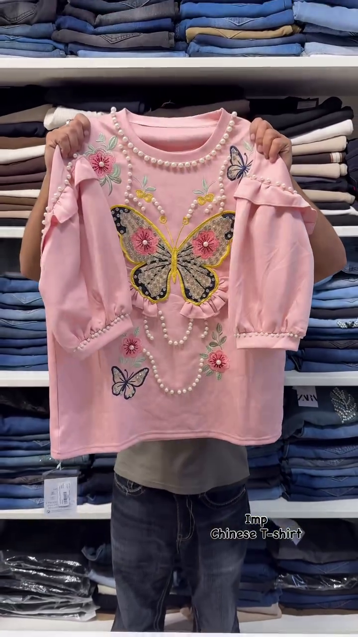 Trendy Butterfly Embroidered Women's T-Shirt with Beautiful Floral Designs, Elegant Pearl Bead Detailing, Stylish Puff Sleeves, and Fashionable Casual Wear Look
