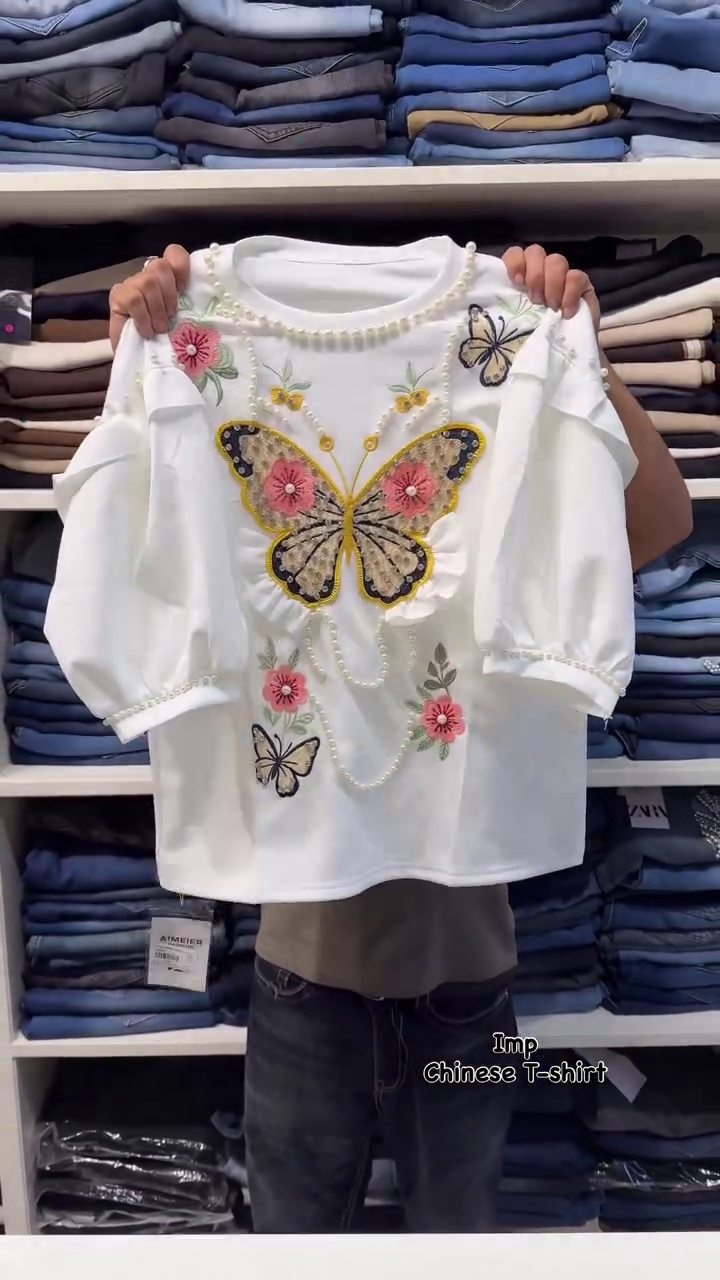 Trendy Butterfly Embroidered Women's T-Shirt with Beautiful Floral Designs, Elegant Pearl Bead Detailing, Stylish Puff Sleeves, and Fashionable Casual Wear Look